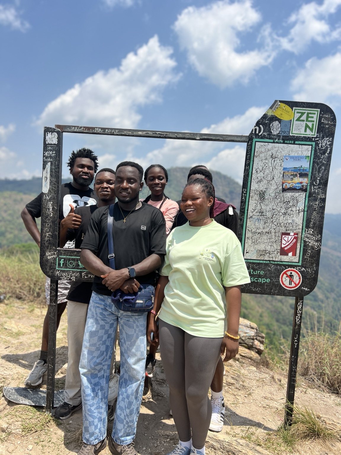 A VibeTrails hiking group enjoying a mountain view